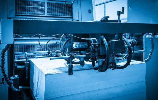 Book printing press with stacked paper sheets for self-help, trading, fiction, manga books Sri Lanka