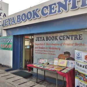 Sri Lanka bookstore exterior with tables displaying self-help, finance, fiction, manga books