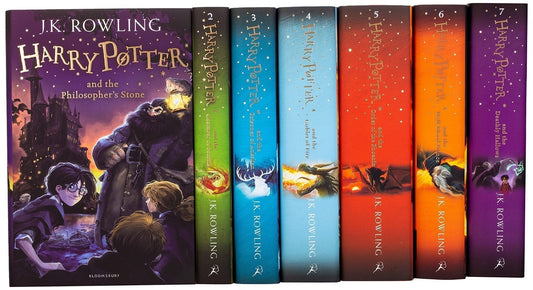 Complete Harry Potter illustrated book set by J.K. Rowling with colorful spines showing titles and artwork