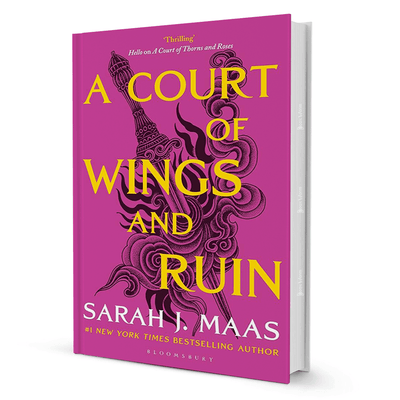 A Court of Wings and Ruin by Sarah J. Maas hardcover fantasy novel with vivid pink and yellow cover